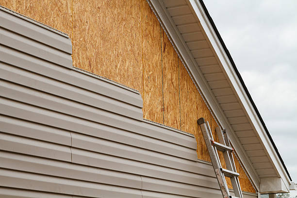 Professional Storm Damage Siding Repair technician working in Middletown, NJ
